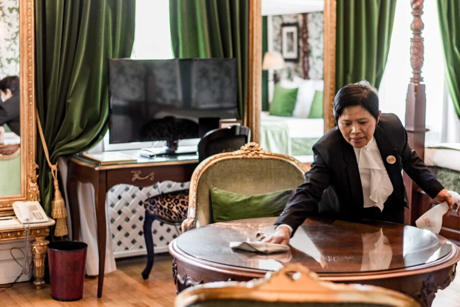 sus housewife cleans hotel rooms